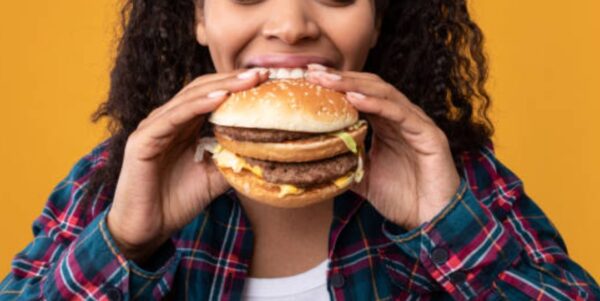 Cover Art For Here’s how to eat a burger without looking like a toddler